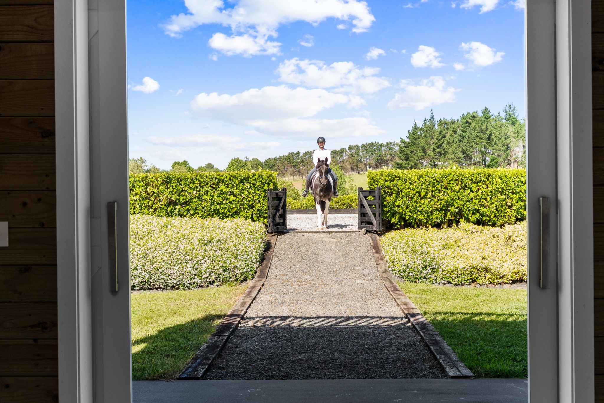 Karaka house with a horse at the door