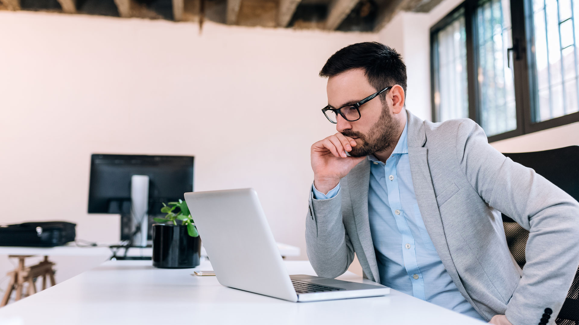 Man unhappy with his pay because his colleague is being paid more.