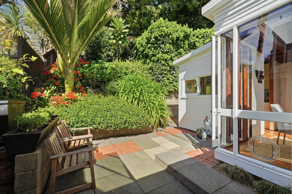 A large terrace off the lounge, a courtyard off the dining area, and direct terrace access from the bedroom provide excellent indoor/outdoor flow.
