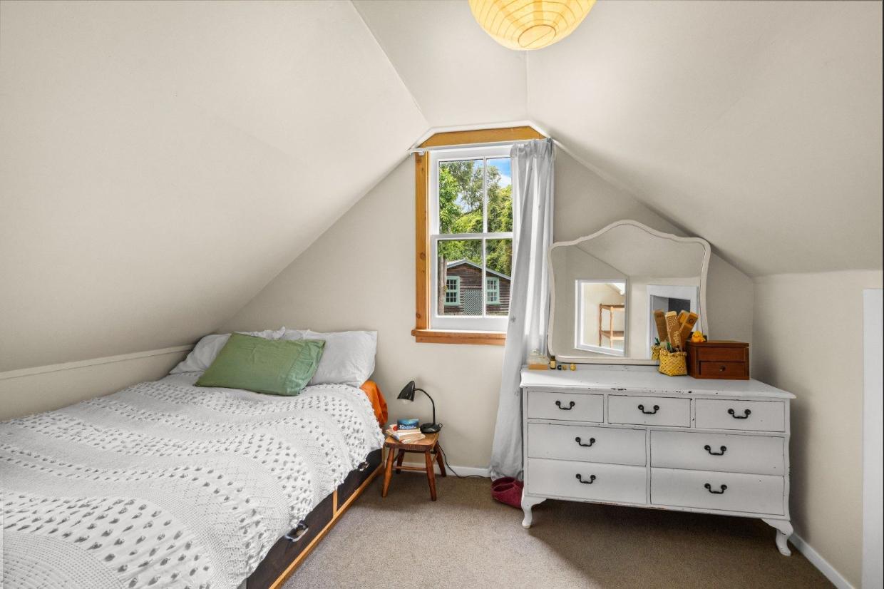 The guest bedrooms are tucked up under the pitched roof, in classic Victorian style.