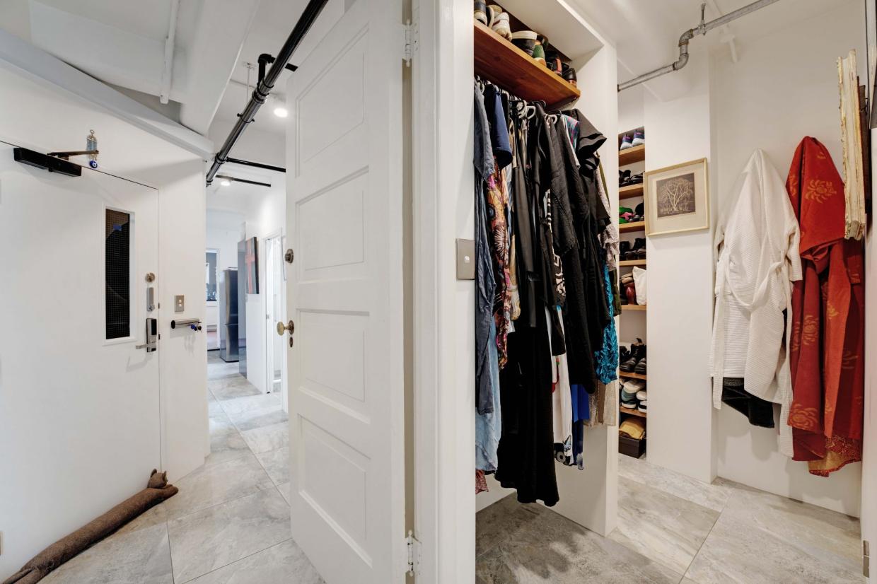 Walk in wardrobe in the master bedroom.