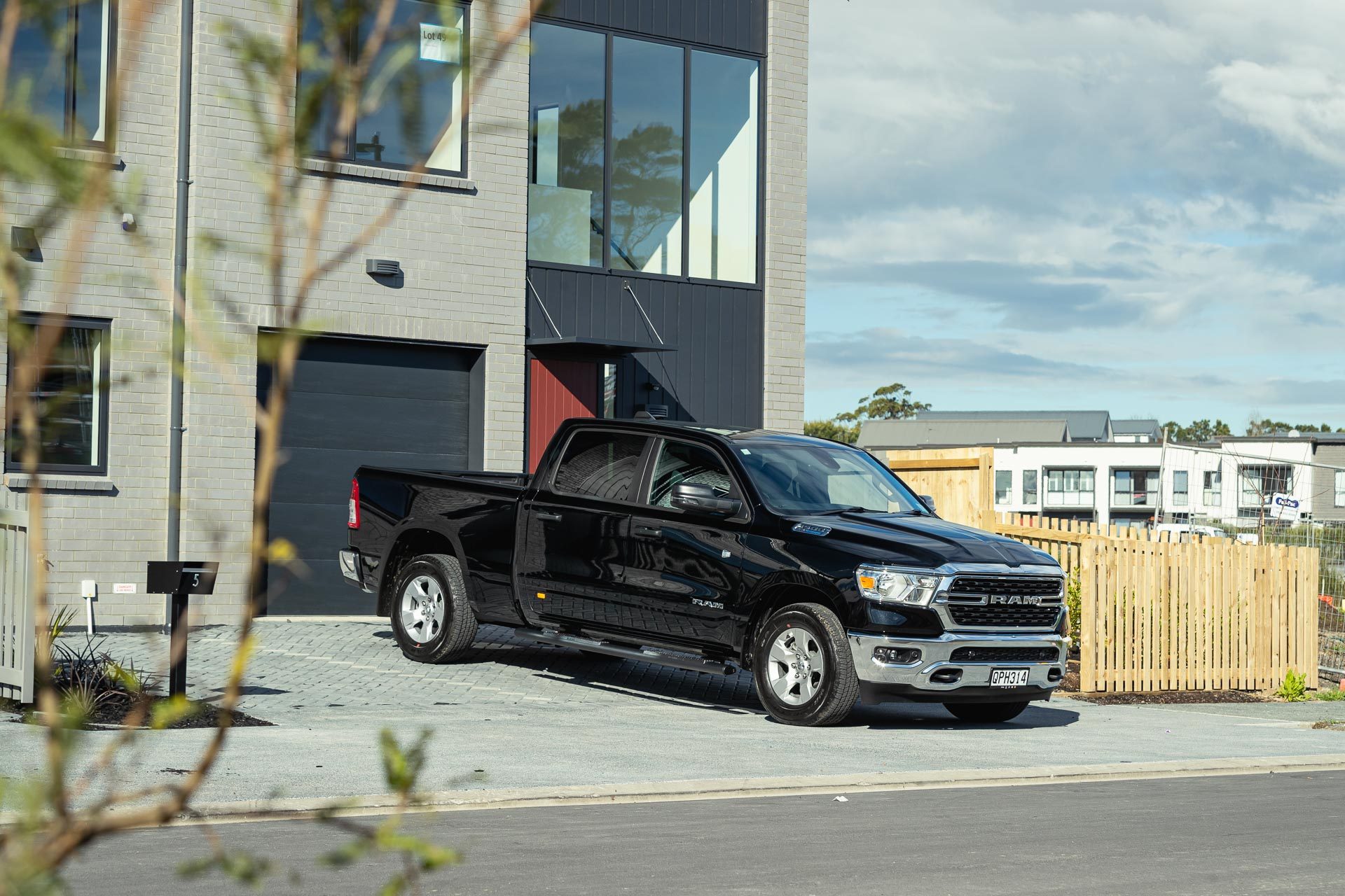 Dodge-Ram-1500-Bighorn-front-quarter-new-home