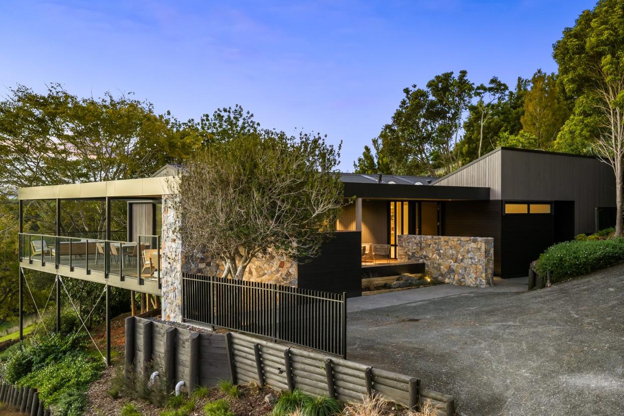 Full property view of exterior design.