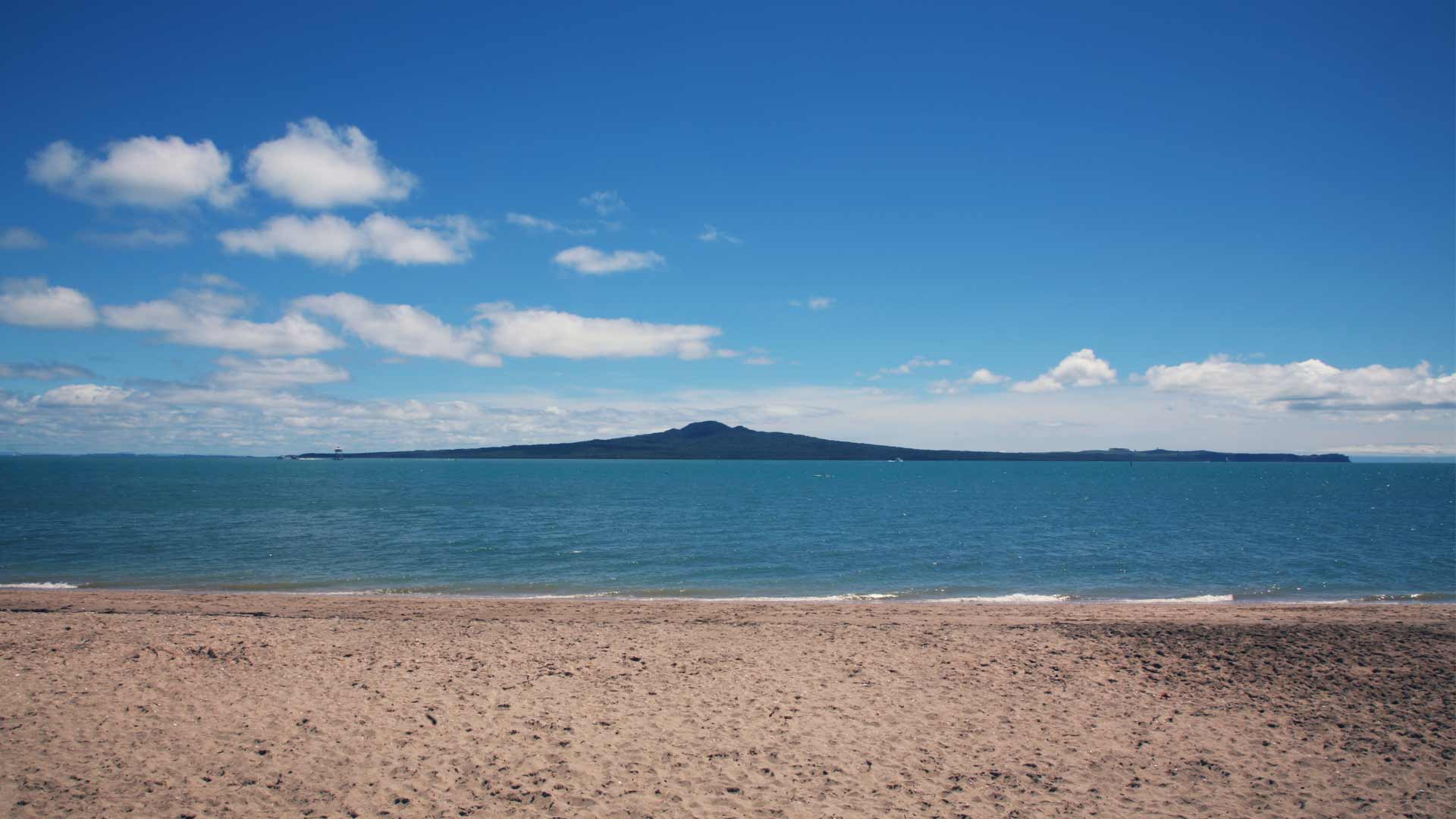 View of Rangitoto Island from Kohimarama Beach.