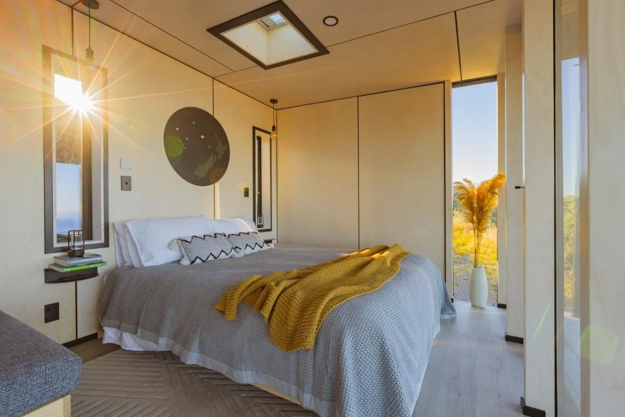 Bright and cozy bedroom with views. 