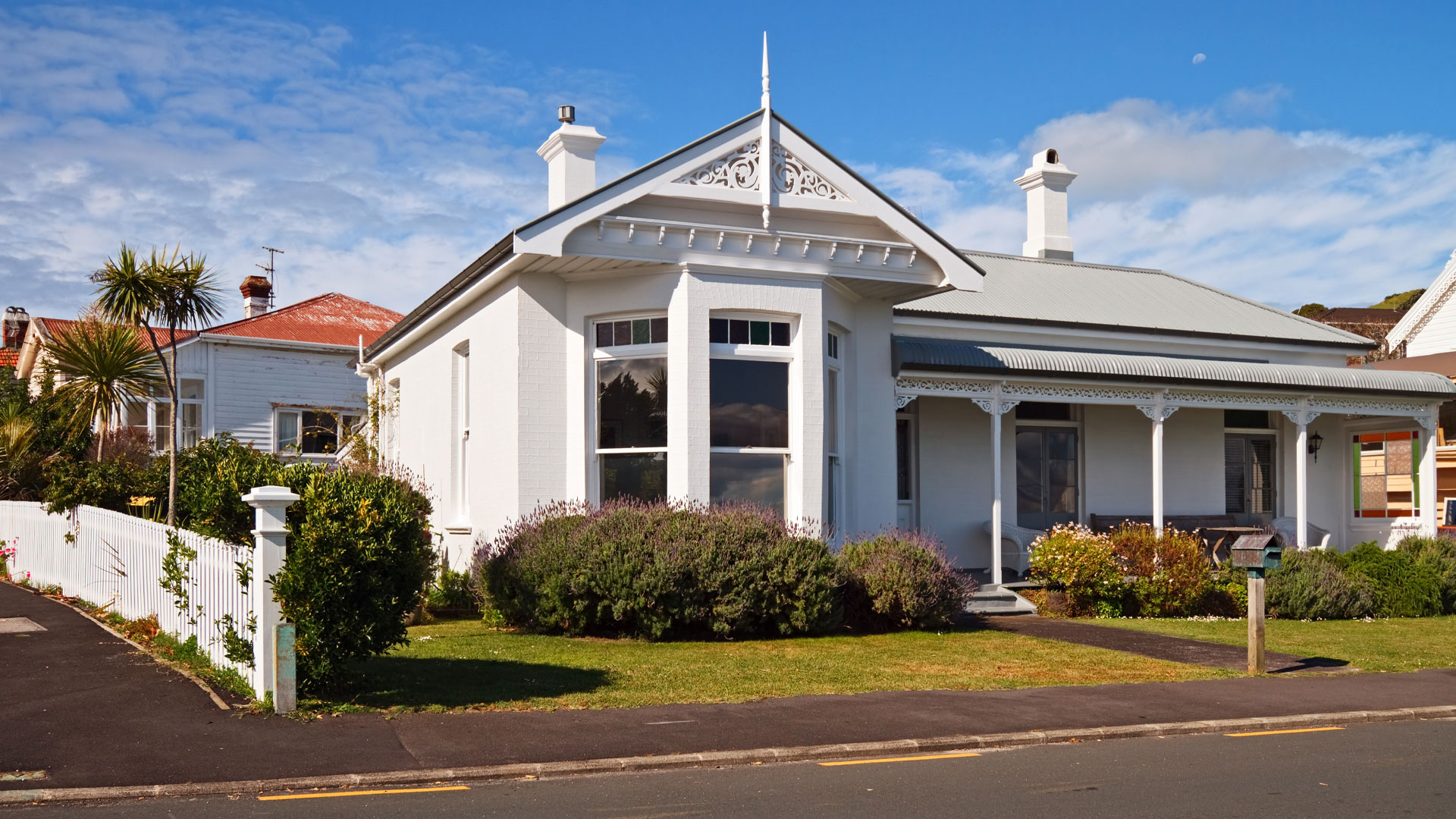 A white Auckland villa in the sun.