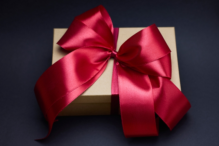 A wrapped gift box tied with a ribbon, symbolising the strict limits on gifting assets to avoid New Zealand rest home fees.