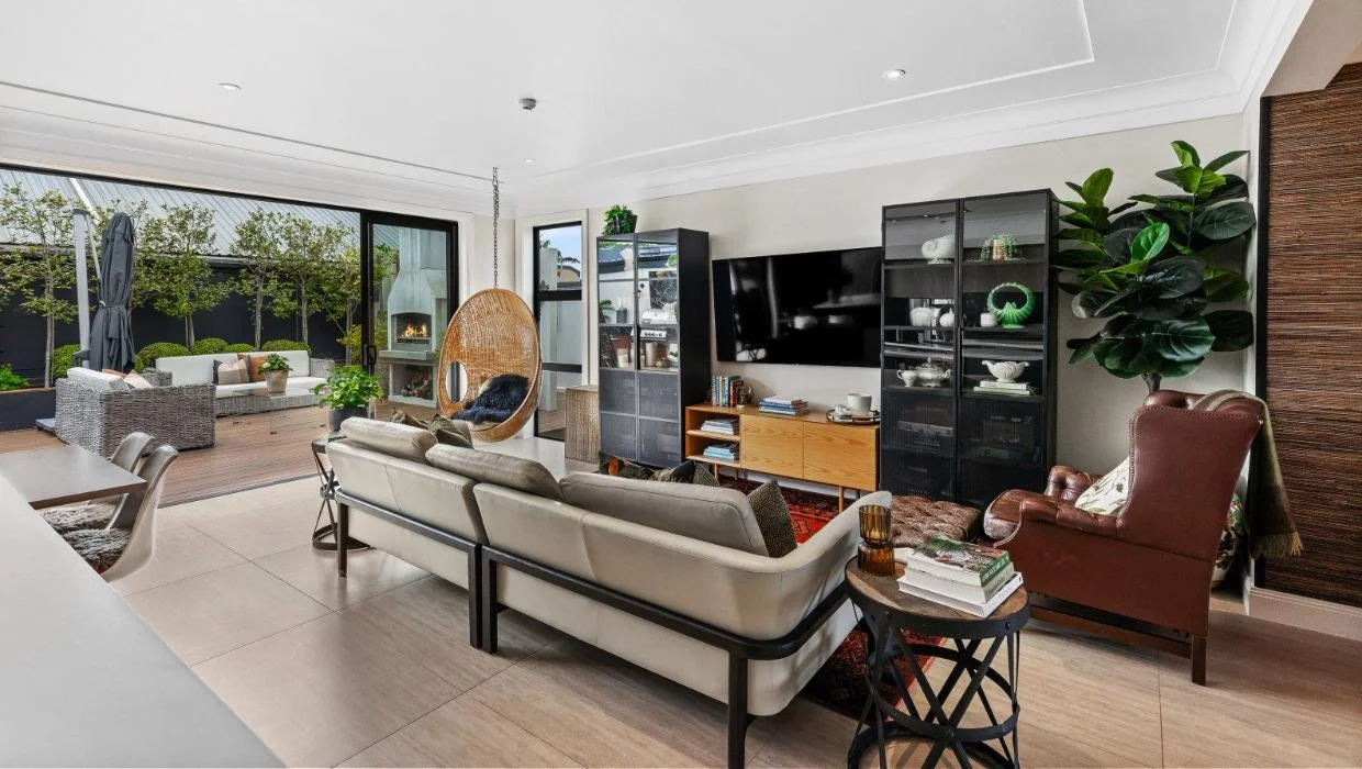 There are two living areas - this is the spacious, open-plan family living space that opens right up to the outdoors. 