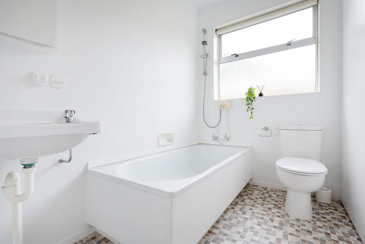 The bathroom is clean and well maintained. 