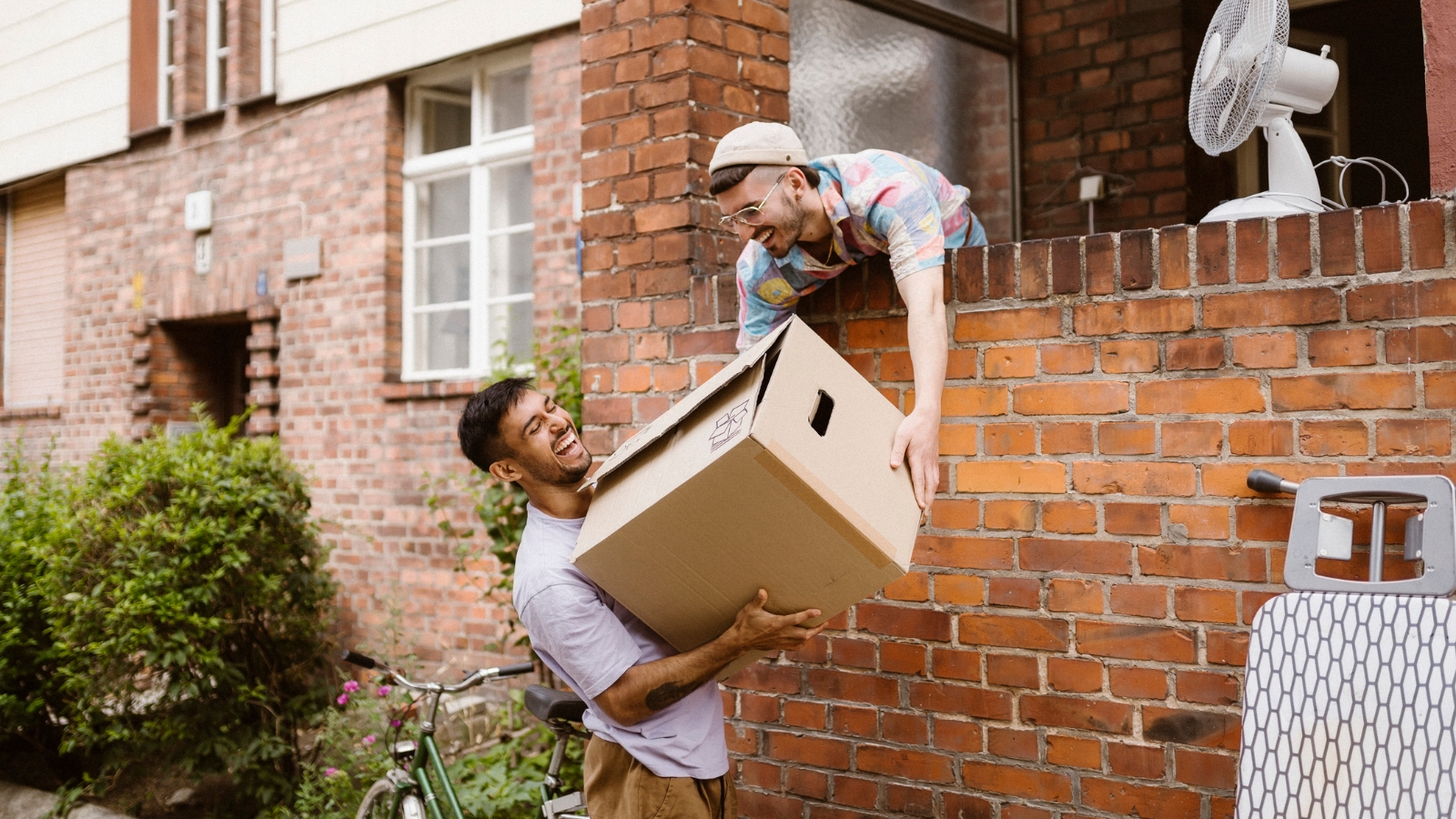 Moving out of a home - two friends. 