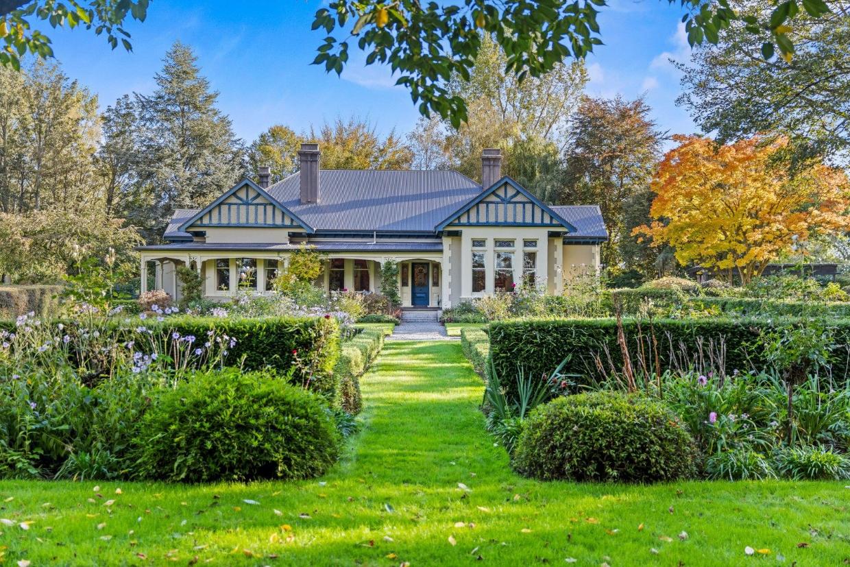 Full view of the property and garden.