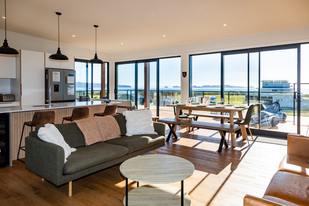sweeping views over the Mercury Islands from the living area