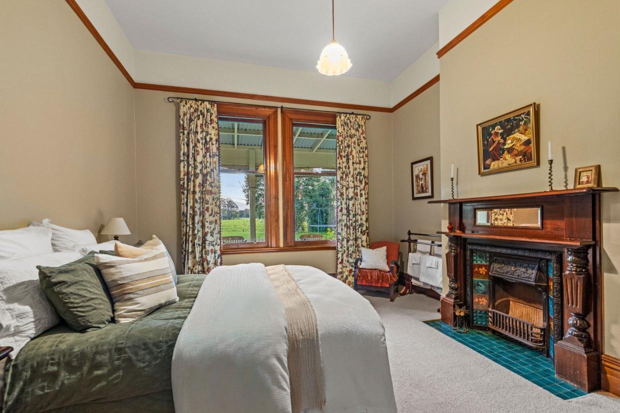 Bedroom with a fireplace