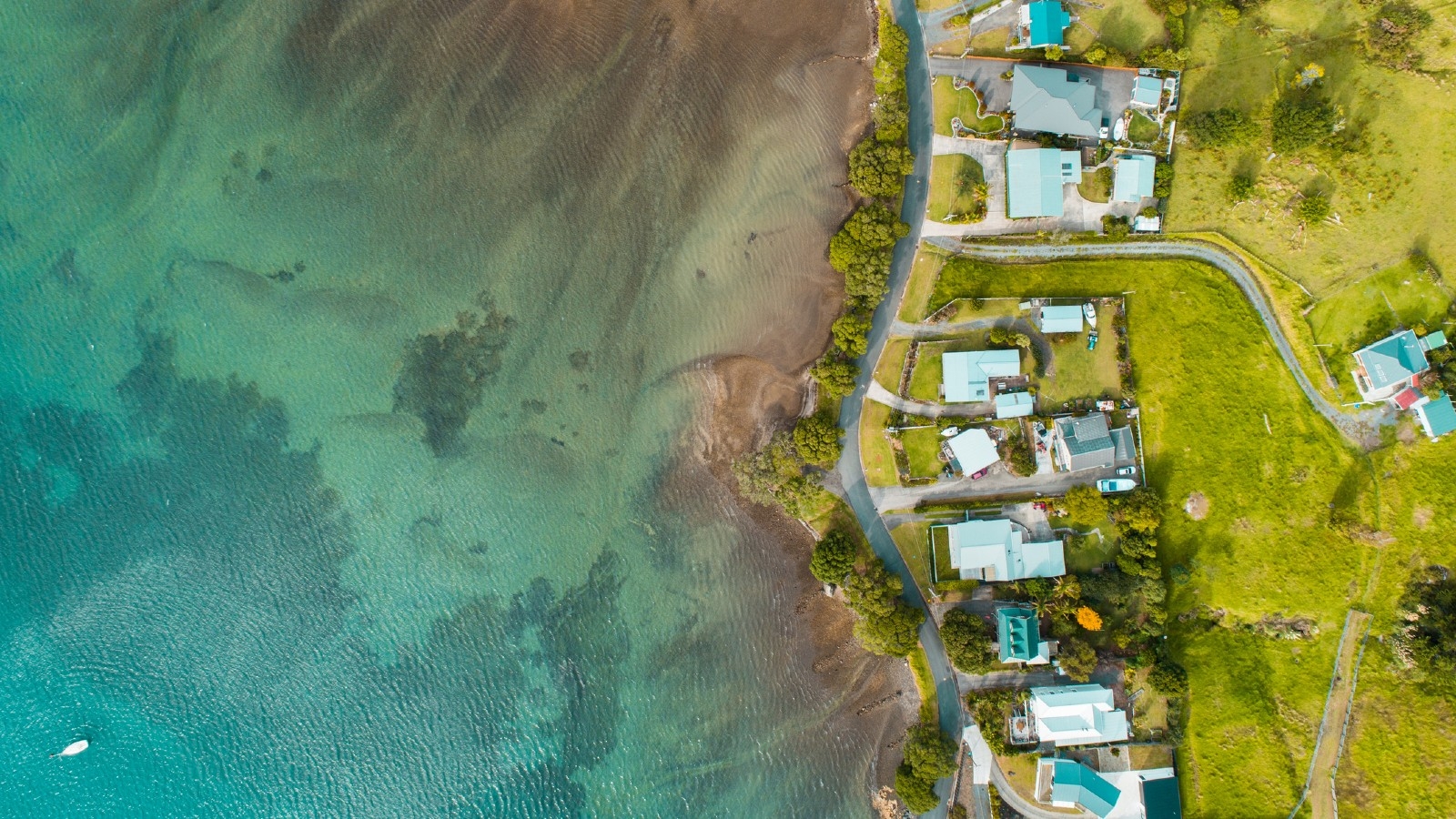 Beachfront homes from up high. What insurance do you need on your house? 