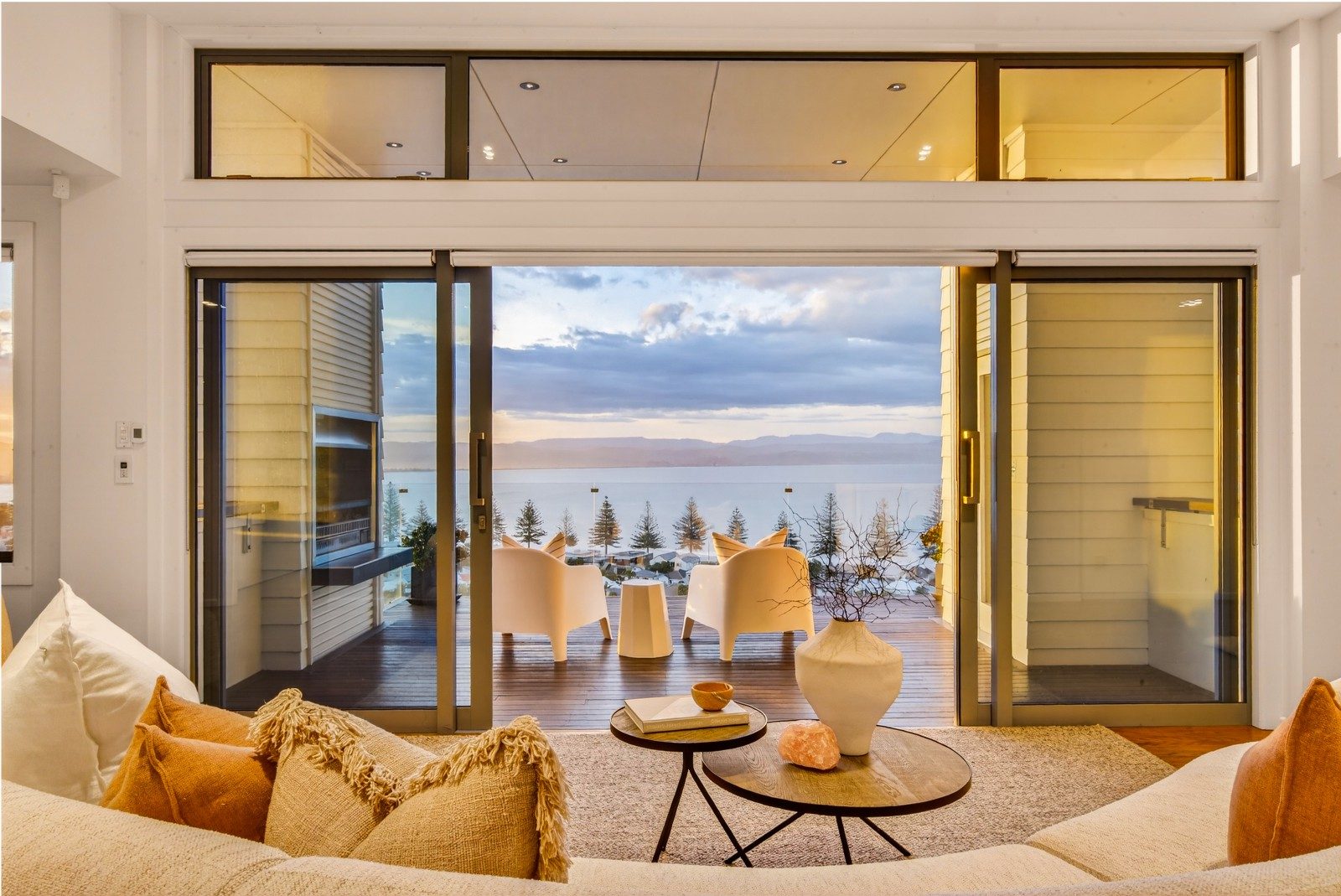 A cinematic panorama of sea, city, and horizon. 