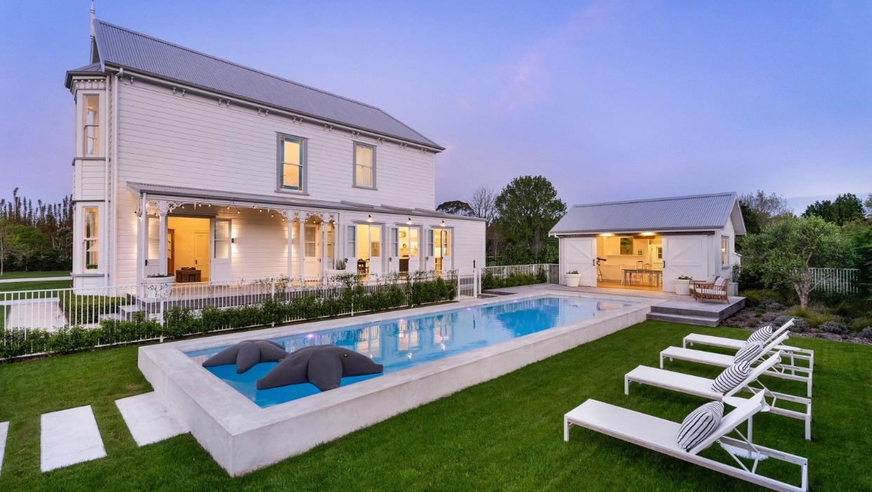 Heated swimming pool and pool house.