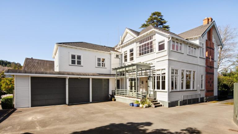 The family use the garage entrance more often than the front door. Photo: RAY WHITE/TRADE ME
