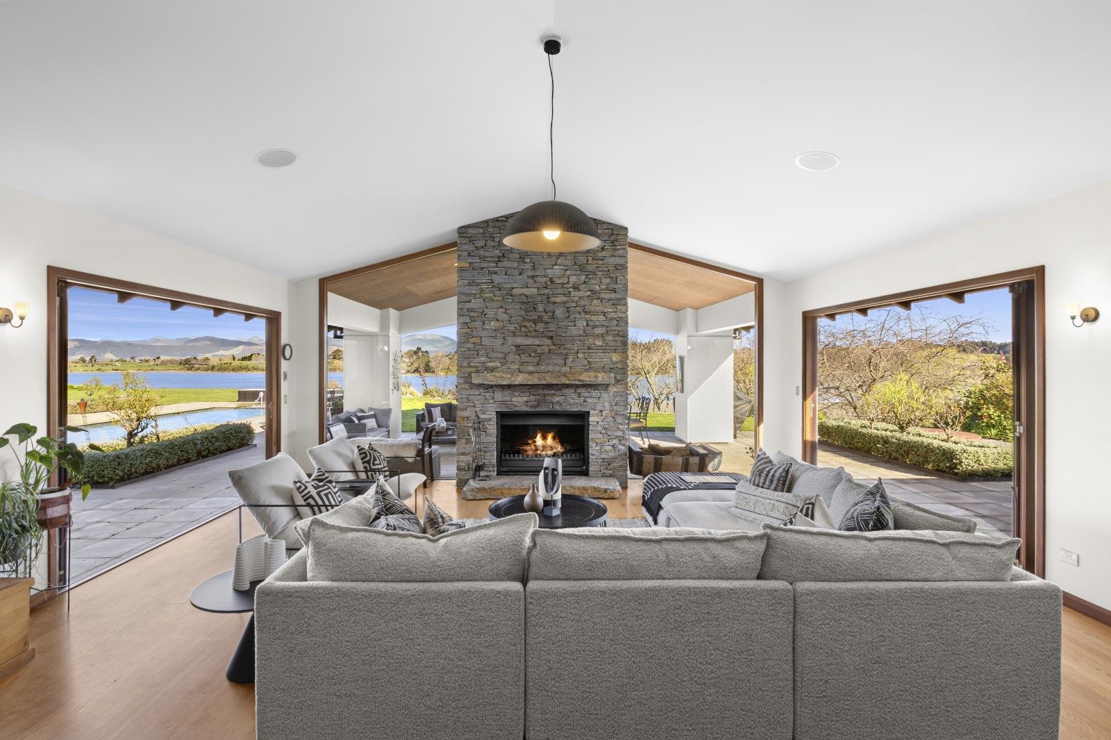 Relax by the open fire with its striking schist surrounds