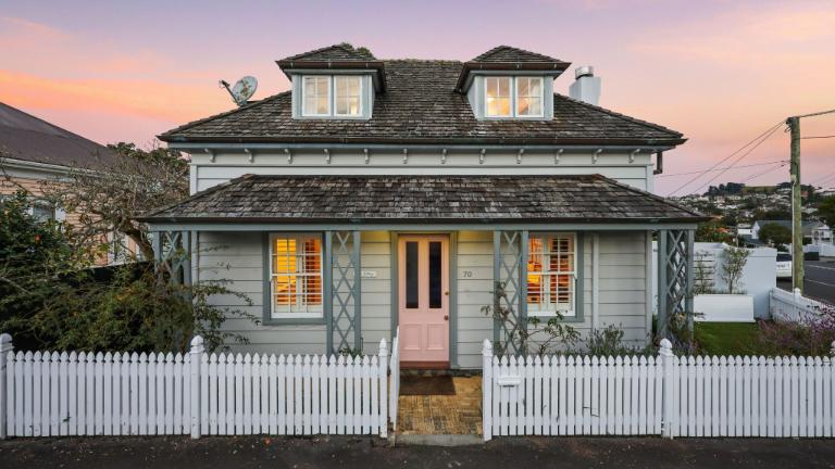 Perfectly symmetrical in form, Rose Cottage in Brighton Rd, Parnell is one of the suburb’s most recognisable homes. It sits high and proud on a 203m² section and has just been listed for the second time. Photo: Ray White