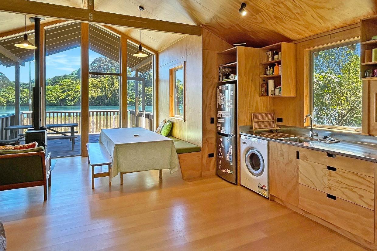 With a fully timber-lined interior, the cabin has a warm, inviting ambience. There’s a woodburner to provide heat in winter. 