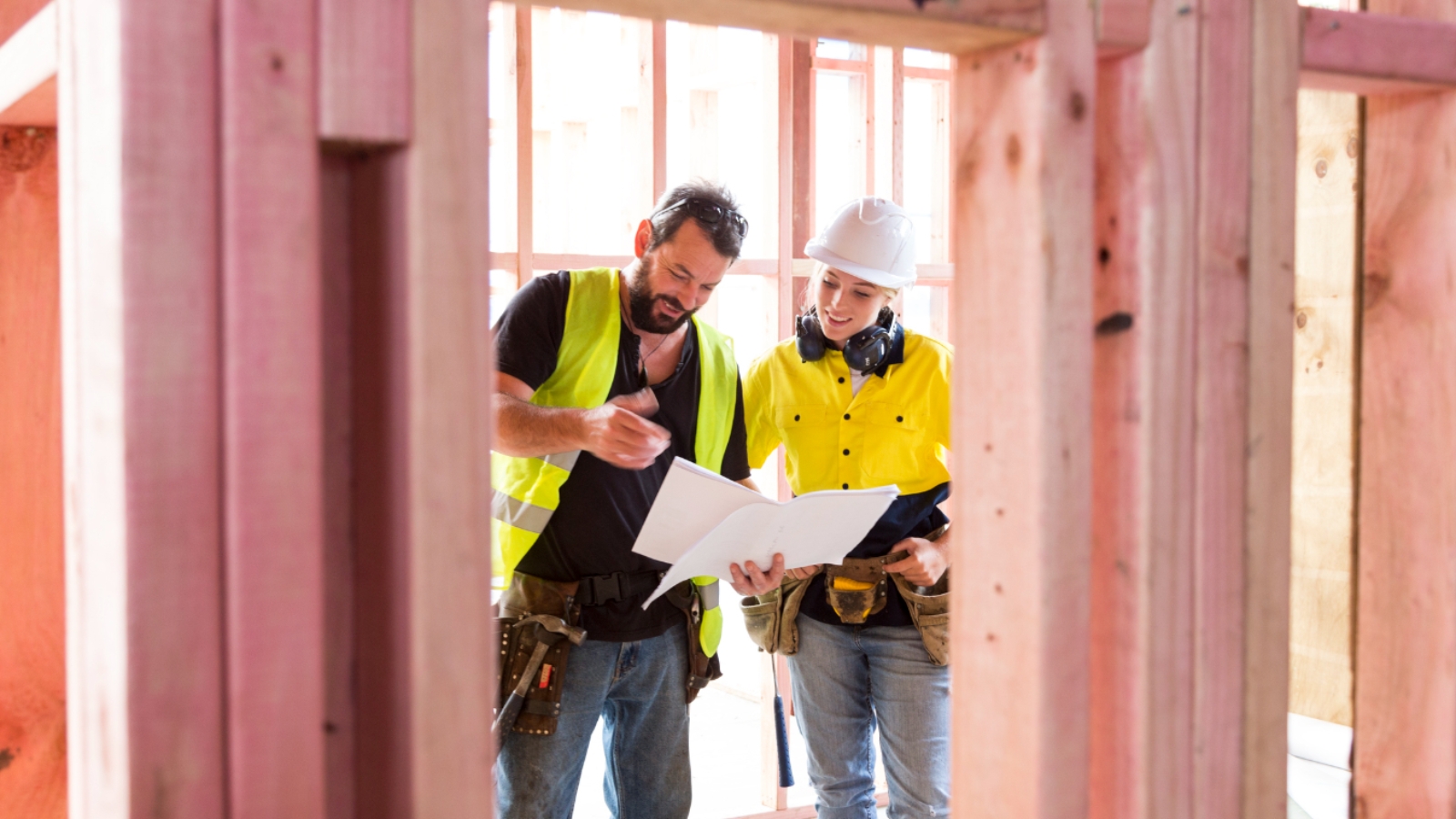 Builders looking at plans