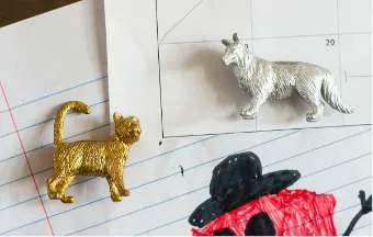 animal magnets spray-painted silver and gold