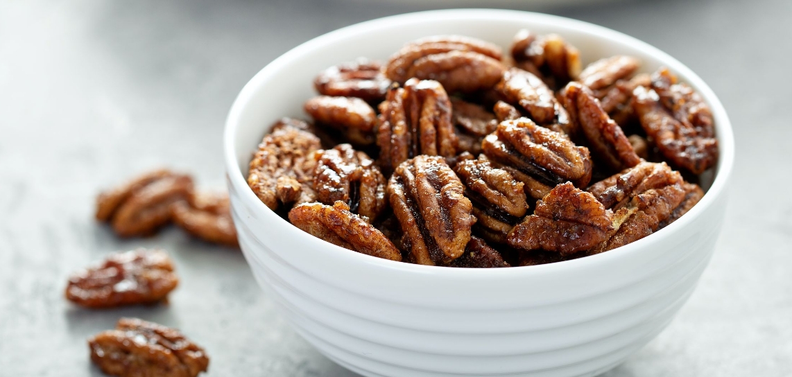 Bowl of maple-spiced pecans