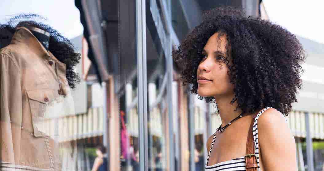 Woman at storefront