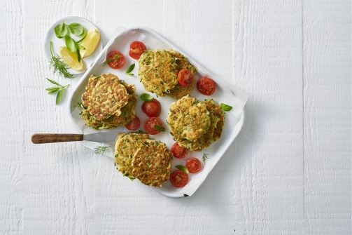 Zucchini tofu fritters with blistered tomatoes