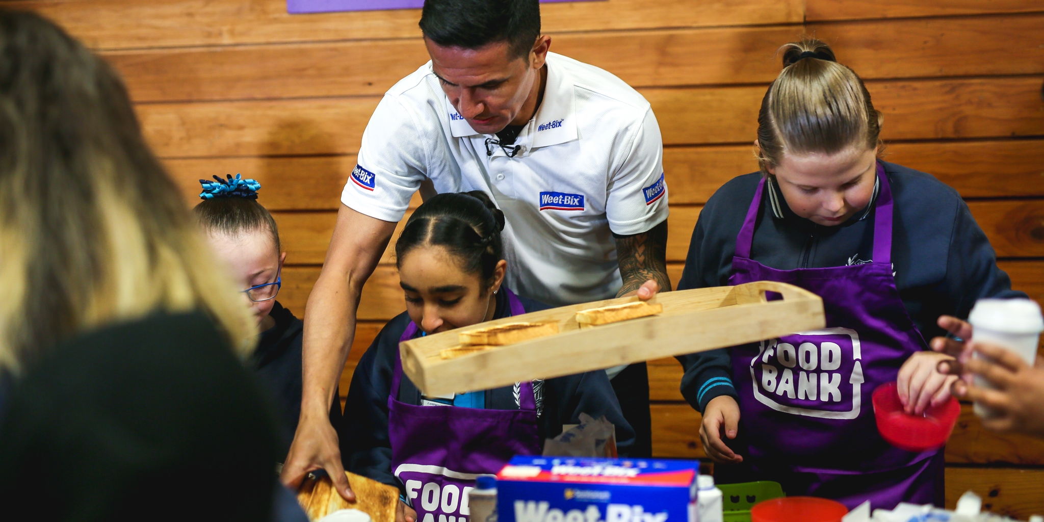 TIm Cahill serving breakfast