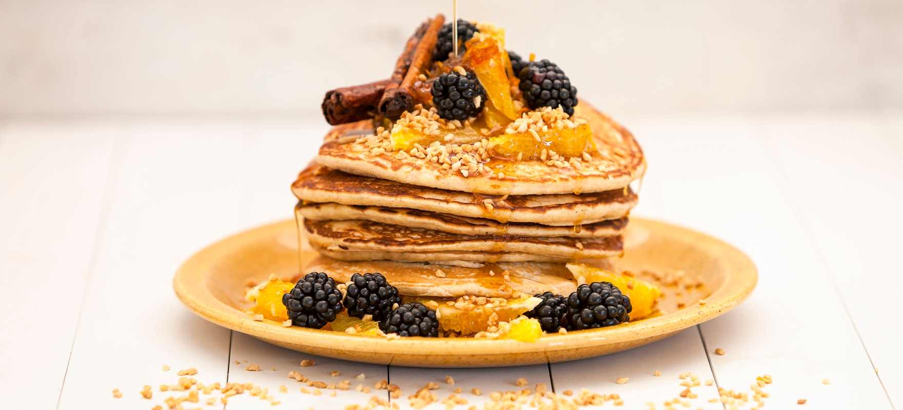 Orange pancakes with apple cinnamon syrup