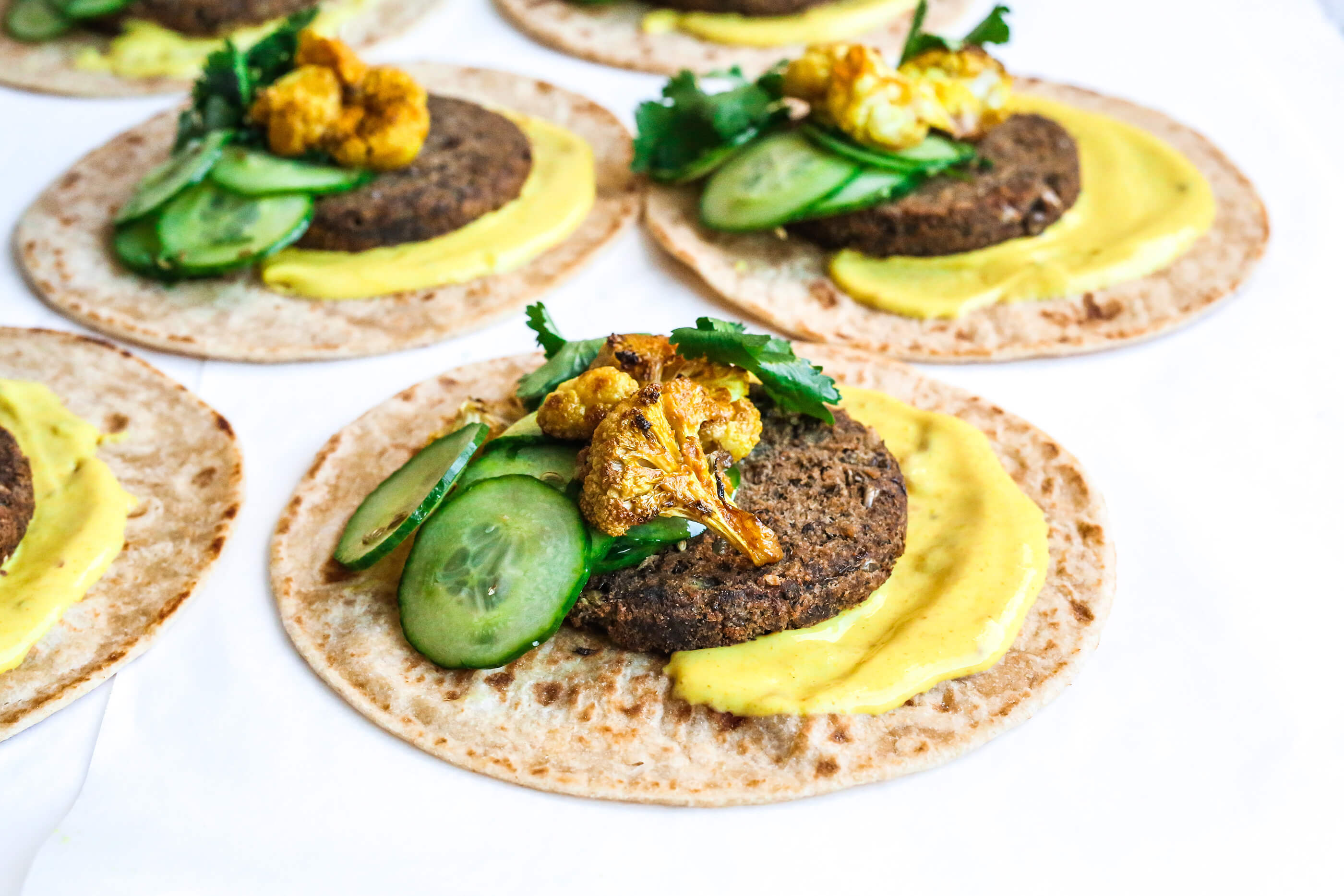 Roti wraps with lentil patties and cucumber fennel salad