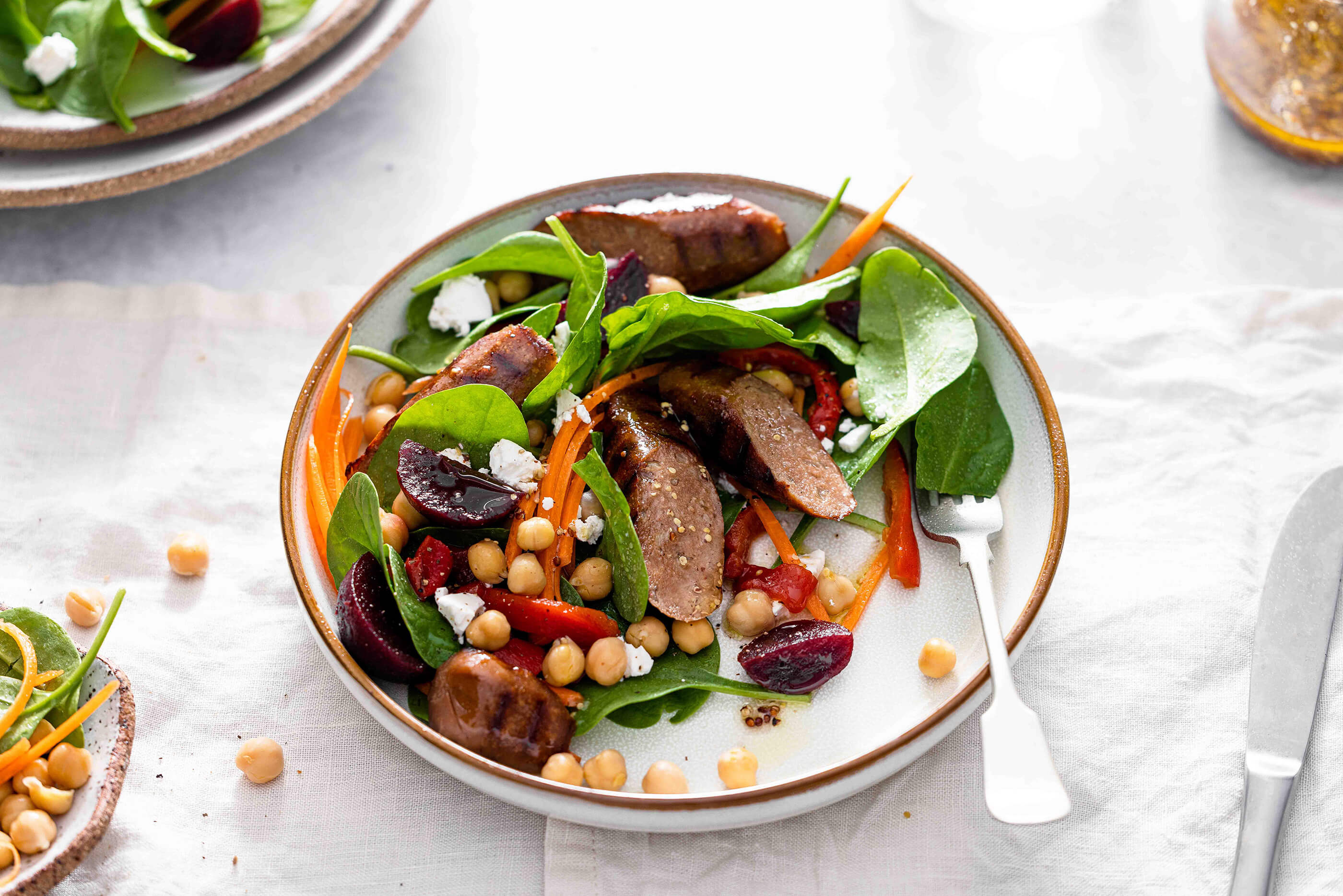 Vegie Sausage, chickpea and roast capsicum salad
