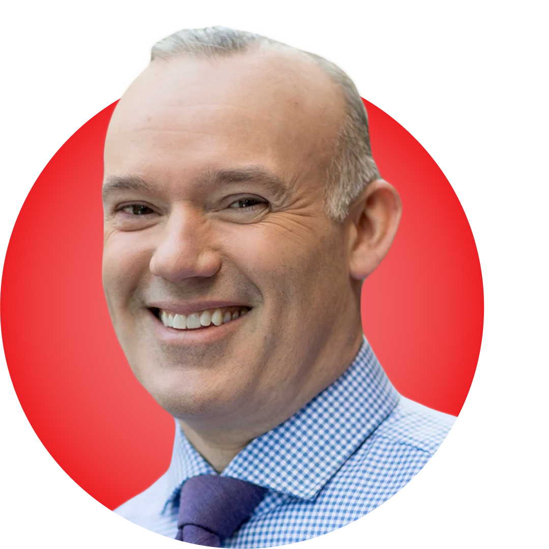 Headshot of Scott Blandford on a red circular background.