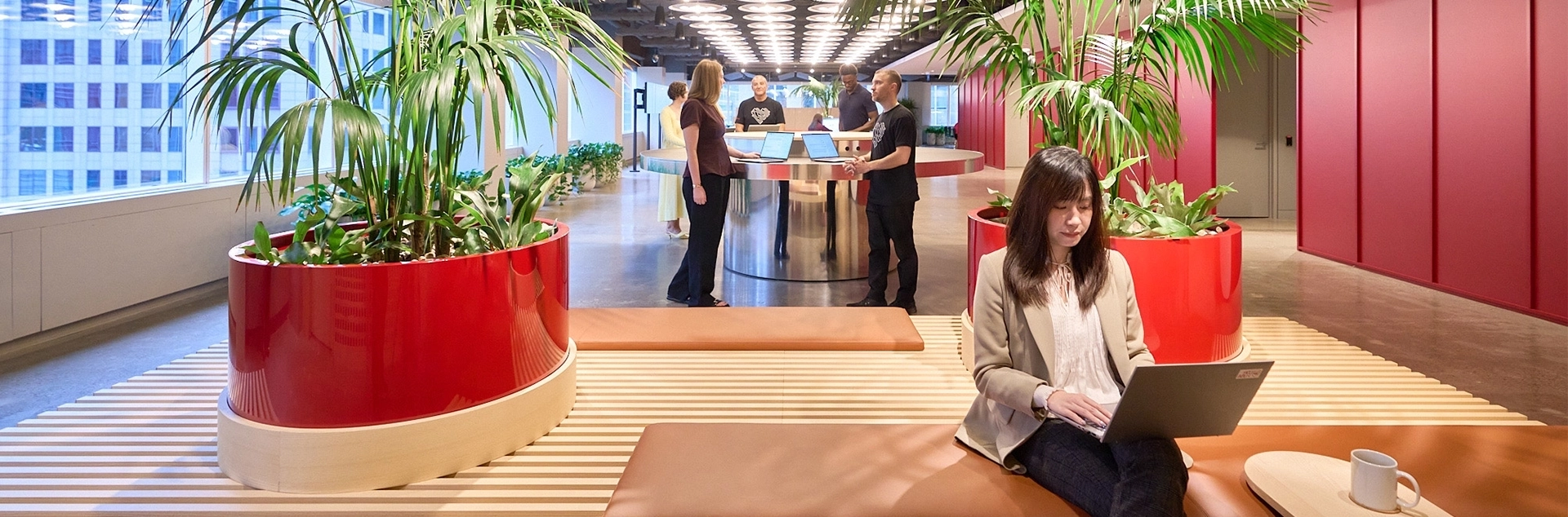 Employees working in a booth at a Morningstar office.