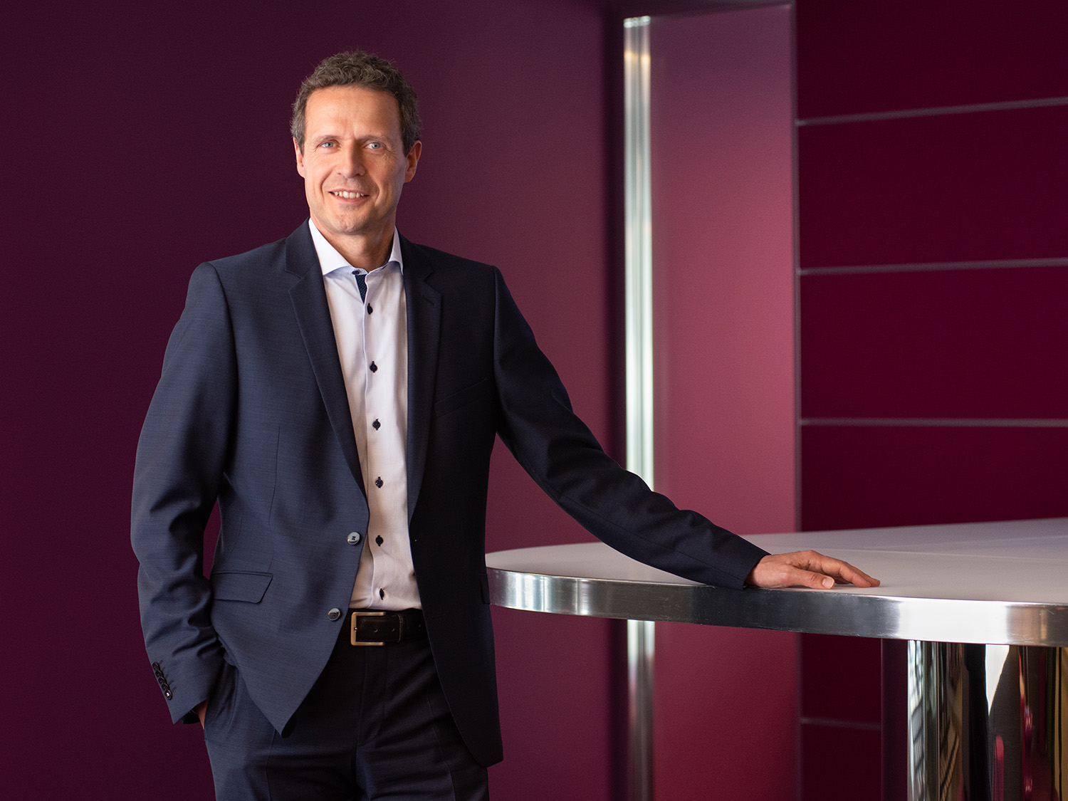 A professional portrait of Detlef Scholz in a Morningstar office.