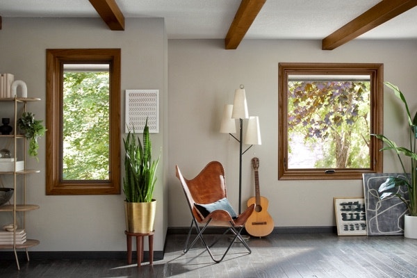 Wood colored window trim in a neutral home space