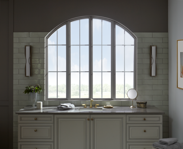 Pella specialty shaped windows with arch top and grilles in bathroom