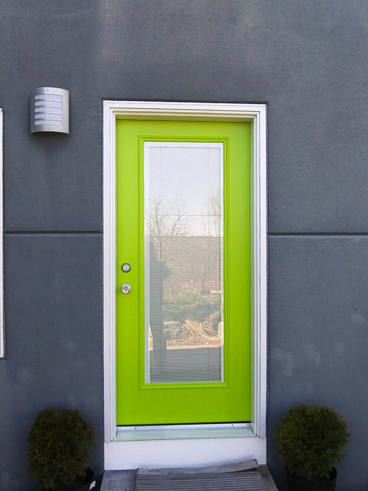 Bright green front door