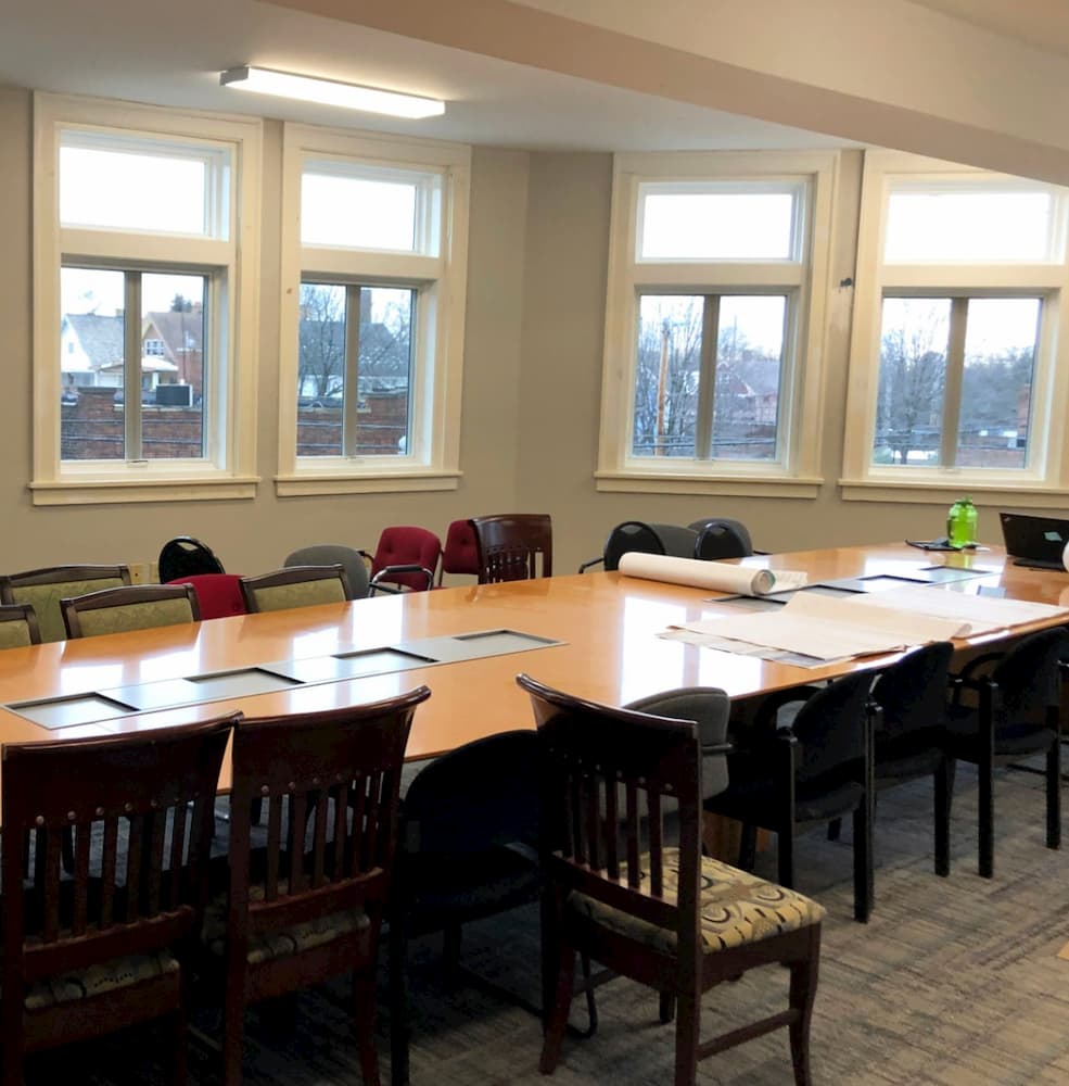 Board room with new wood casement and awning windows