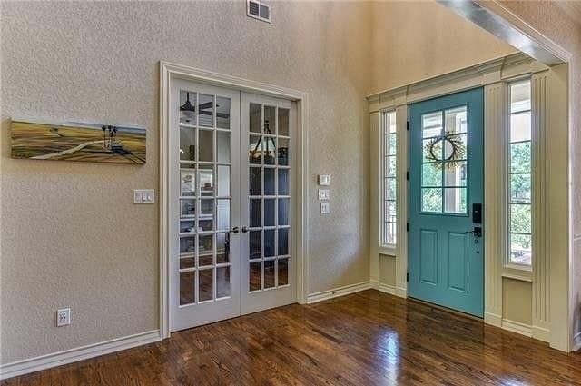 Interior home with blue front door 