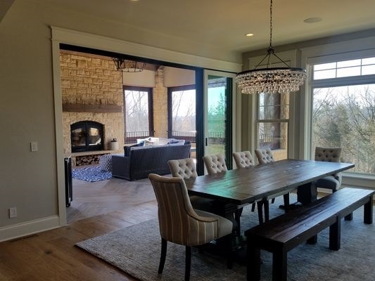 Interior view of home in Dubuque featuring open multi-slide patio doors 