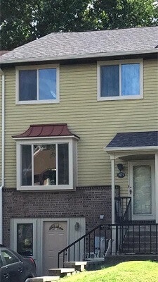 after image of philadelphia home with new vinyl sliding windows