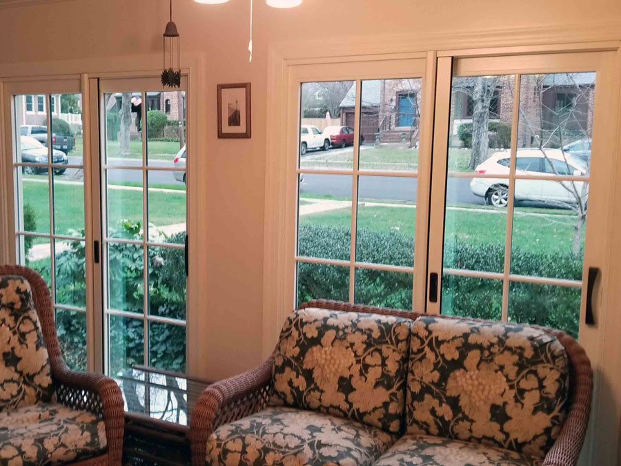 Interior of wall with double wood sliding patio doors in Richmond, VA, home