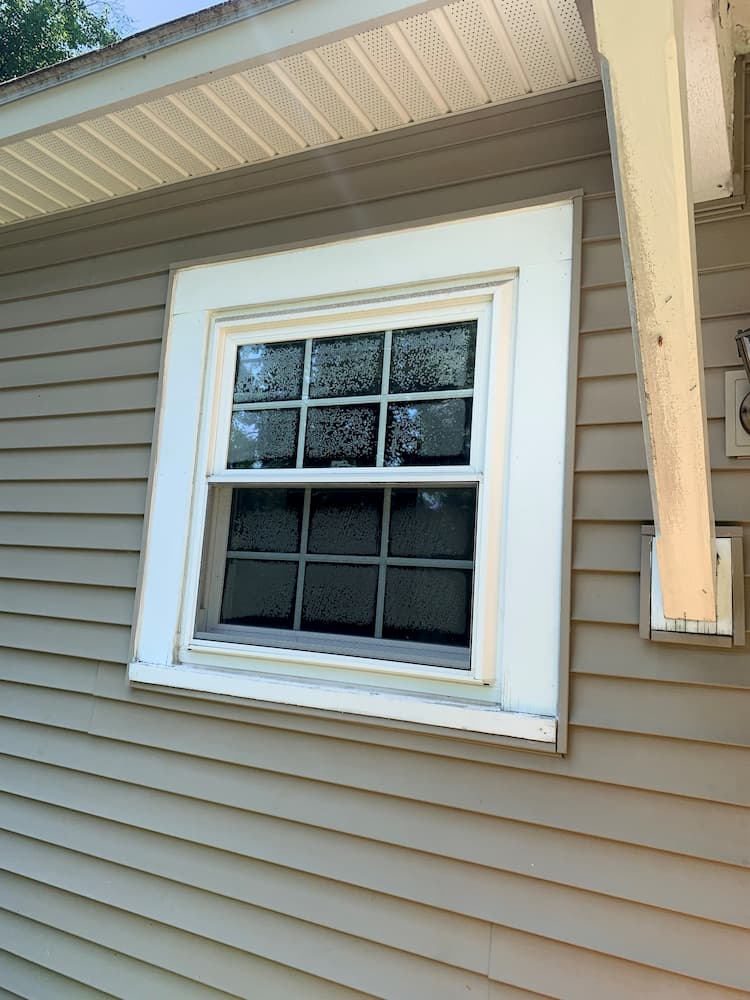 double hung window with broken seal