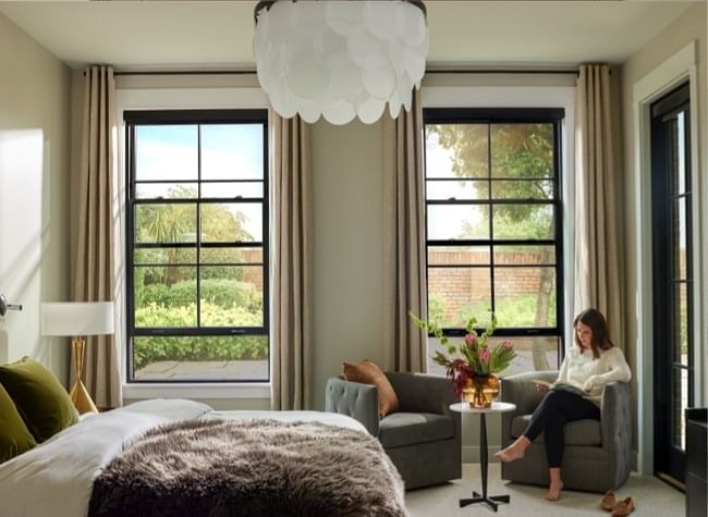black double-hung windows with hidden screens