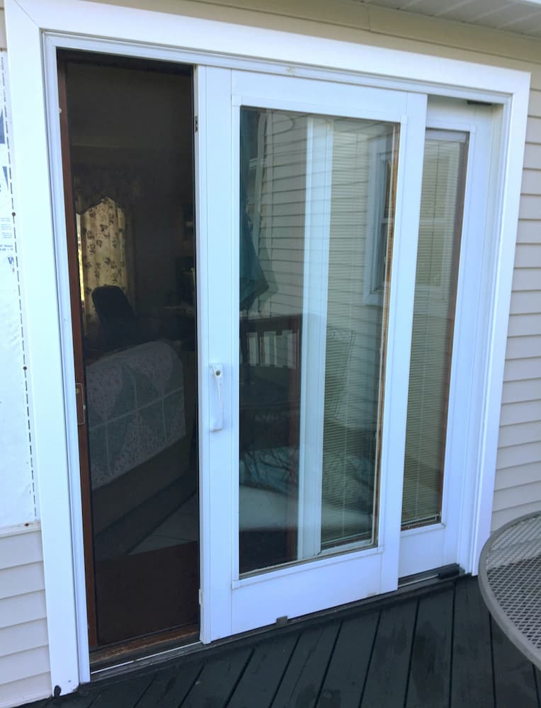 Exterior view of 20-year-old sliding patio door