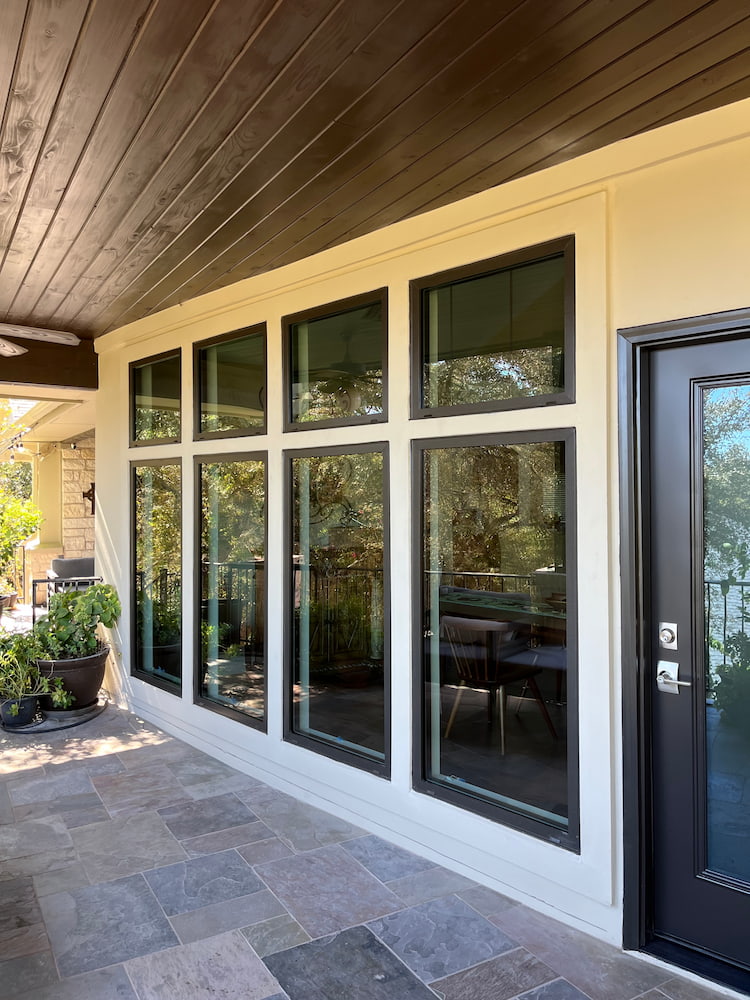Fiberglass awning and picture windows on Austin home