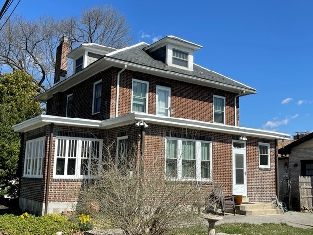 Brick Harrisburg home with new white windows
