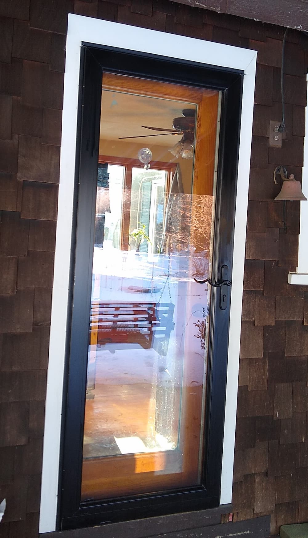 After exterior photo of newly installed Pella storm door